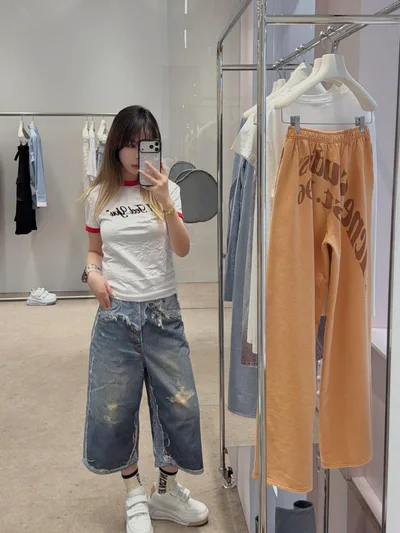 Acne Studios Trompe L'Oeil Print Distressed Denim Shorts