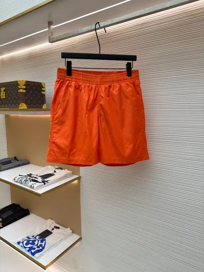 LOUIS VUITTON Dark Monogram Elastic Beach Shorts