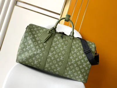 Keepall 50 Travel Bag in Monogram Shadow Calfskin with Embossed Two-Tone Design