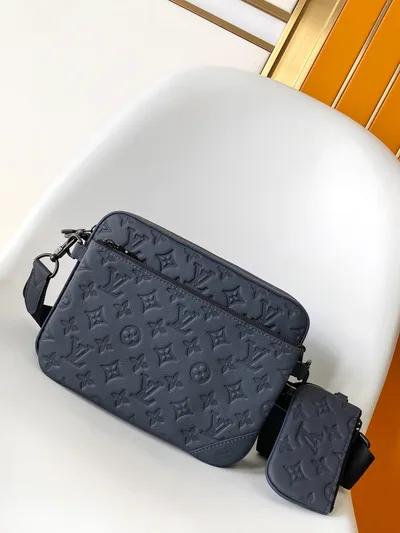 Trio Messenger Bag in Monogram Embossed Calfskin Leather
