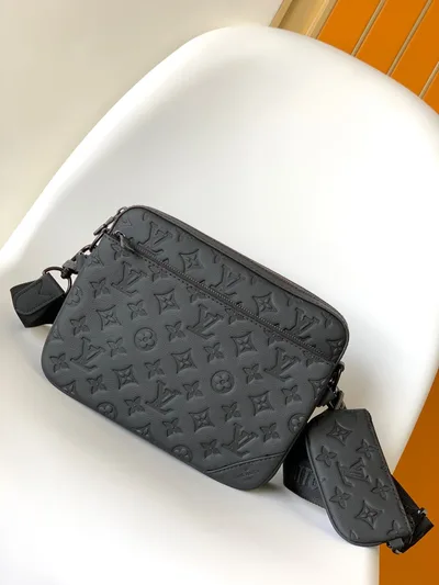 Trio Messenger Bag in Monogram Embossed Calfskin Leather