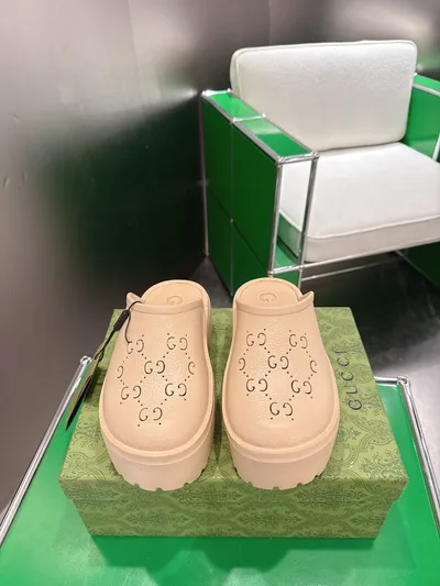 Gucci Perforated Carved Clogs