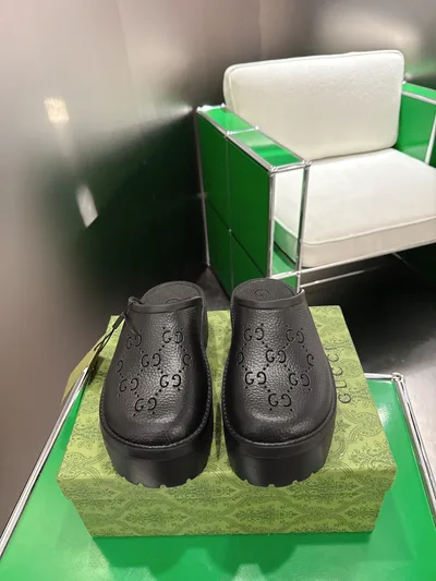 Gucci Perforated Carved Clogs